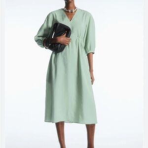 cos light green dress Quitan Dress in Mint Sage at Worthwhile main image 1